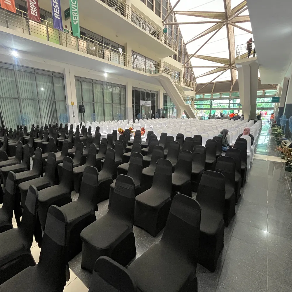 Abu Dhabi — Furniture rental: Auditorium Chairs Black White Covers