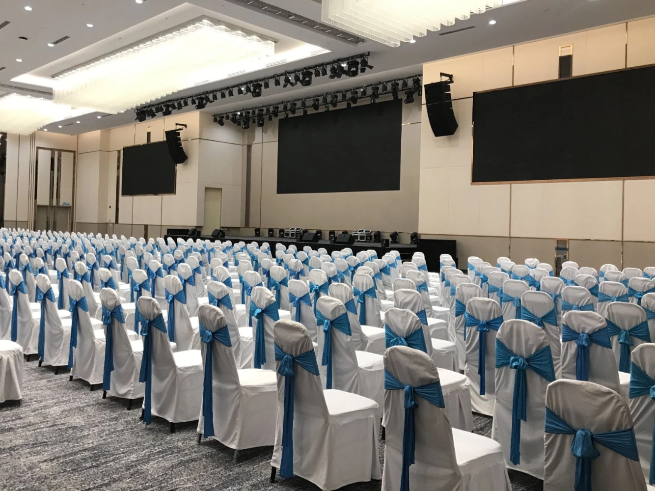 Abu Dhabi — Furniture rental: Conference Chairs White Blue Sashes