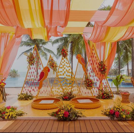 Dubai — Decorations services: Haldi Outdoor Triangle Backdrop Uruli