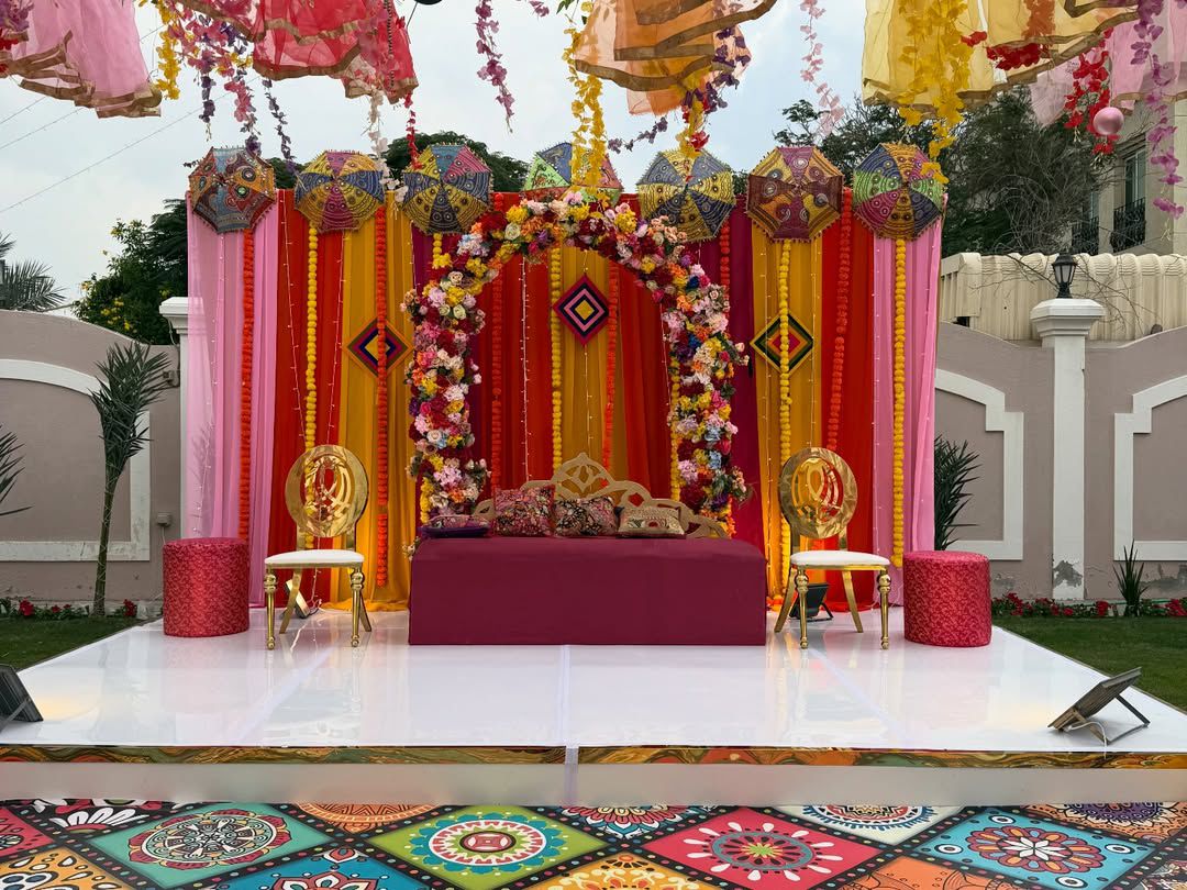 Dubai — Decorations services: Mehndi Stage Colorful Drapes Kites