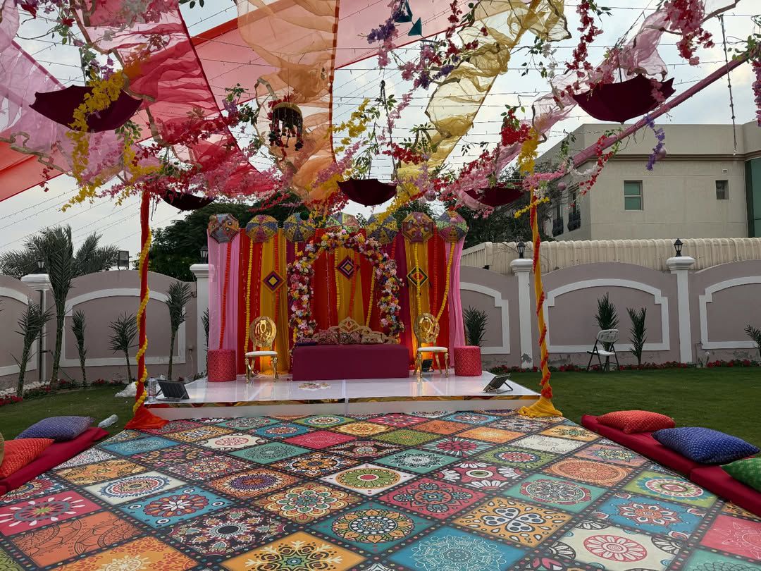 Ajman — Decorations services: Mehndi Stage Colorful Drapes Kites 5