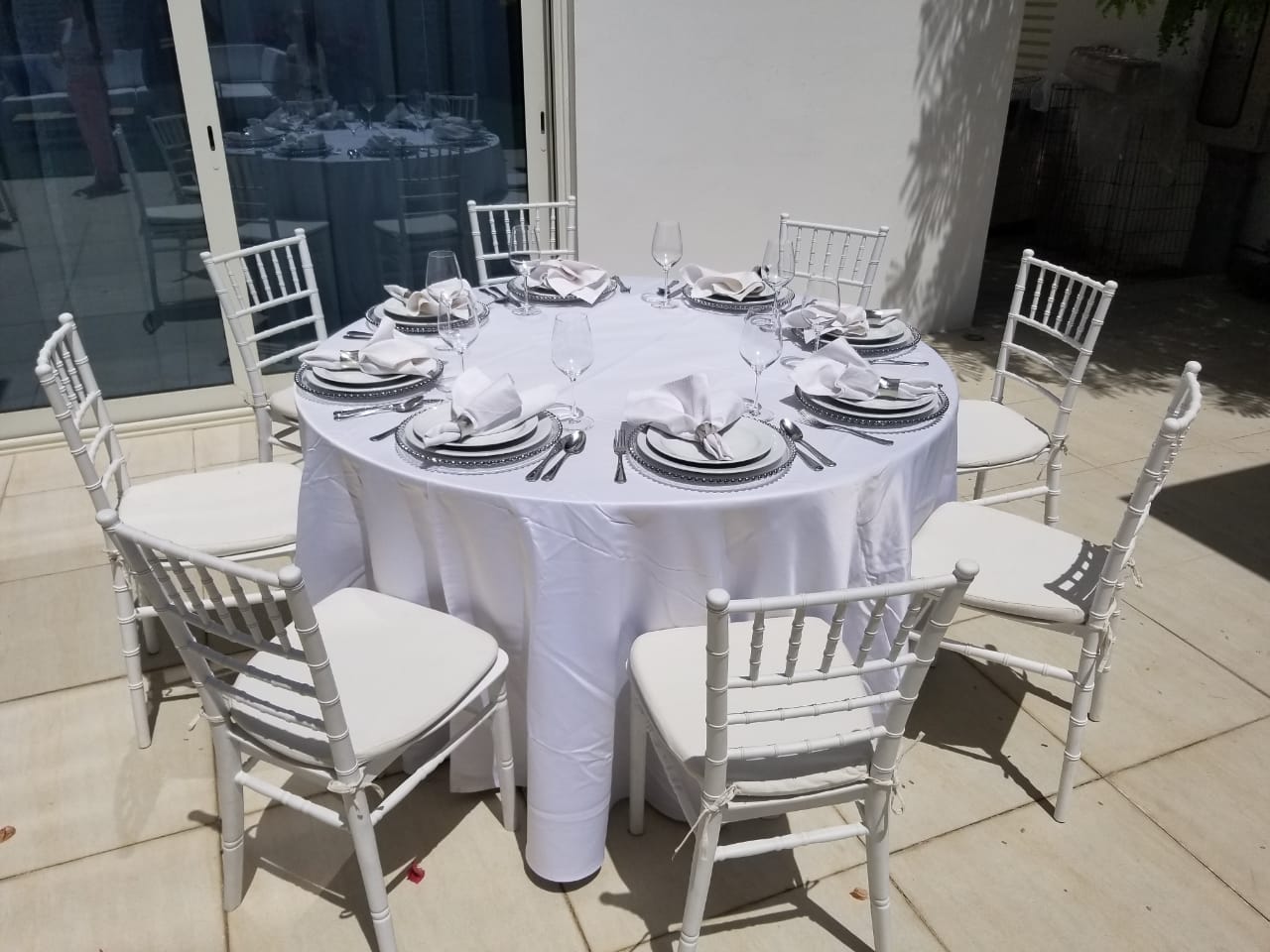 Abu Dhabi — Furniture rental: Outdoor Chiavari Table White Settings