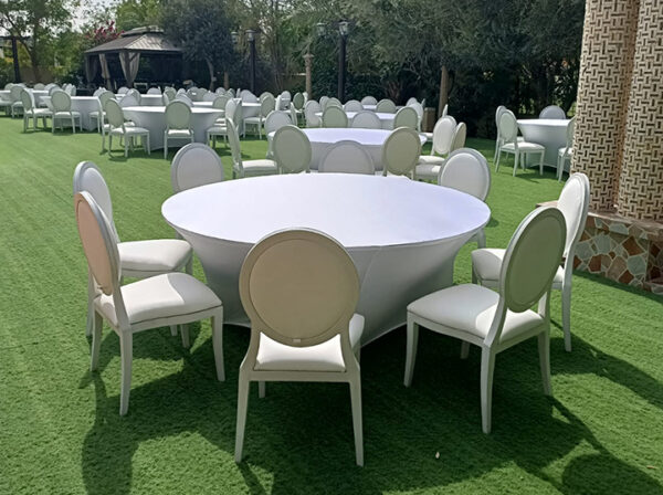 Ras Al Khaimah — Furniture rental: Round Banquet Tables White Dior Chairs